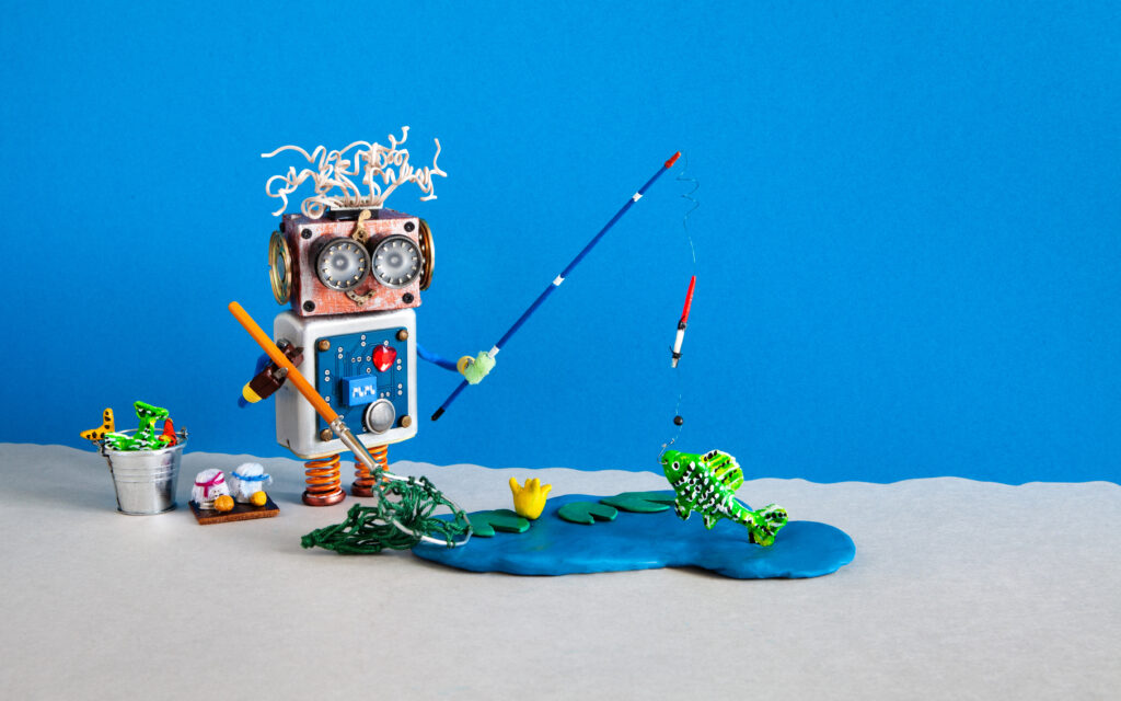 Robot is fishing with a fishing pole. The water is is blue clay and the fish is green clay. Image represents using creative marketing to hook your audience. 